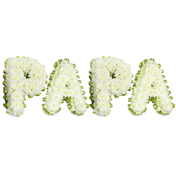 An elegant and heartfelt floral tribute meticulously shaped to read 'PAPA' in bold, uppercase letters, each letter built from dense, snowy clusters of small white chrysanthemums and similar delicate blooms. The surface of each character is plush and slightly rounded, petals overlapping in an artisan pattern that creates both texture and a soft visual rhythm across the four letters. A narrow, ruffled ribbon of pale green and sprigs of subtle greenery trace the outer edges of every letter, providing a cool, clean contrast that outlines the forms with discreet precision. Set against a seamless white background, the arrangement reads as a composed, reverent statement, suitable for a funeral service, memorial chapel, or a personal tribute laid upon a graveside mound. The craftsmanship is apparent in the tidy spacing and uniformity of the blooms-each stem placed with deliberate care to sustain the integrity of the letter shapes while conveying tenderness. Imagine this piece brought by a local florist to a modest service near Queensbury Station, positioned in a parish hall off Kingsbury Road or delivered with quiet respect to families meeting at a small chapel in the Wembley area; it carries a local sensitivity to scale and sentiment. The white and green palette signals calm, purity, and remembrance, making the tribute an unobtrusive yet powerful expression of love for a father or grandfather whose memory is held close by family and neighbours alike.