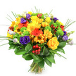 The image presents a joyful, full-bodied bouquet set against a spotless white background, the simplicity of the setting making every petal and leaf stand out in sharp relief. The arrangement is round, lush, and tightly gathered, with visible stems neatly bound, evoking the feel of a freshly prepared hand-tied design from a trusted Queensbury florist. Dominating the composition are bright yellow roses, their petals coiling inward in classic spirals, partnered with generous yellow chrysanthemums whose dense, fine petals create a cushiony texture and a golden glow. Woven through these are vibrant orange gerbera daisies and smaller orange daisy-like flowers, their flat, open faces and bold tones adding a burst of sunshine reminiscent of a warm afternoon stroll near Queensbury's local cafés and shops. Deep purple lisianthus blossoms thread gracefully between the warmer colours, their ruffled, rose-like petals lending depth and a refined, almost romantic touch, while a few buds in softer lavender and creamy white hint at new blooms about to unfold. Zesty lime-green button chrysanthemums appear as compact, spherical accents, punctuating the design with lively freshness. Throughout the bouquet, clusters of glossy, ruby-red hypericum berries provide a festive sparkle and a smooth, rounded texture that contrasts with the softness of the flowers. A rich base of dark green foliage, likely Ruscus, frames the entire arrangement, its broad, shining leaves grounding the design, while slender blades of ornamental grass extend outward to suggest natural movement. The overall impression is one of happiness and abundance, a perfect bouquet for celebrations, congratulations, or brightening a home anywhere in Queensbury, from residential streets around Kingsbury Circle to homes along Kenton Road.