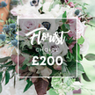 A lush Florist Choice bouquet, priced at ?200, is captured in a close-up that reveals the hand-placed detail and the premium quality you expect from Flower Delivery Queensbury. The arrangement gathers a refined cast of blooms: light pink garden roses in full bloom, creamy whites with pale lavender-tinged roses, and crisp white anemones with distinctive dark centers that anchor the composition. Spiky blue eryngium thistles rise as architectural accents, catching the eye with a cool silver-blue sheen. The bouquet is set among a generous bed of greenery-eucalyptus-inspired leaves and burgundy plum-toned foliage-that adds depth and a touch of woodland drama. A translucent white frame overlays the center, carrying Florist Choice and the price ?200, bridging branding with artistry without overpowering the natural form. The soft background hints at an outdoor setting or airy studio, inviting thoughts of a wedding, anniversary, or heartfelt gift delivered to homes across Queensbury.Flower Delivery Queensbury brings this refined arrangement to local windows and doorsteps, offering fresh stems and reliable service across North London. The composition feels generous yet intimate, a celebration of craft that speaks to the rhythms of Queensbury's streets. The petals glow with gentle light, the textures invite a tactile memory of velvet petals and crisp greens, and the overall mood is one of quiet celebration and timeless elegance. Suitable for same-day delivery to friends and family in Queensbury and neighboring districts, this bouquet blends classic romance with modern sophistication, making it a perfect centerpiece, bouquet, or luxury gift for the home.