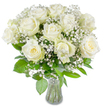 A luminous, bridal-white bouquet fills the frame: about a dozen large, fully opened white roses sit in tight harmony, their velvety petals unfurling in gentle spirals. At the heart of several blooms a faint, creamy-yellow blush warms the centers, giving the pure white a soft, natural depth. Scattered through and around the roses are delicate sprays of baby's breath (Gypsophila paniculata), tiny clustered blossoms that form a cloud-like veil and lend an ethereal, misty texture against the fuller petals. Beneath the blossoms, varied green foliage fans out-broad glossy leaves and finer serrated greenery that provide a fresh, verdant base and lively contrast. The stems are neatly trimmed and visible through a simple clear glass vase; the vase's slightly flared neck reveals clear water and pale green stems, anchoring the composition with understated clarity. Bright, even light washes the arrangement, setting the whites aglow and revealing the satin sheen of each petal and the soft shadows between blooms. Up close you can almost sense the roses' faint, classic perfume-clean and slightly creamy-balanced by the green, herbal freshness of the leaves. This arrangement reads as serene and timeless, an elegant choice for weddings, anniversaries, or quiet sympathy gestures. As a local Queensbury florist I often place similar bouquets for customers across Queensbury and neighbouring Kingsbury and Wembley, where their simple beauty brings calm and comfort whether used as a centrepiece in a home on a quiet street or a gentle tribute at a memorial table.