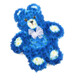A lovingly constructed floral teddy bear fills the frame, its shape clearly defined against a bright white backdrop that makes every petal stand out. The bear's entire body is composed of vivid royal blue flowers, so densely arranged that no gaps of greenery can be seen, giving the impression of a solid, plush figure. Rounded ears, a full tummy, and slightly spread arms and legs all emerge from this sea of blue, while carefully placed clusters of soft cream and pale yellow blooms create gentle accents. These lighter flowers form the inner ears, a pronounced rounded snout, and four oval paw pads on the hands and feet, adding both contrast and authenticity to the teddy bear likeness. Shining, dark brown eyes with black centres sit above a perfectly positioned black triangle nose, and a simple curved line below suggests a quiet, comforting smile, as if the bear is quietly watching over someone dear. Around its neck, a delicate sheer white bow, likely organza or fine mesh, is tied in a soft, full knot, with light catching its folds and edges. The bear appears slightly tilted on its axis, giving the tribute a sense of natural placement rather than rigid formality. In Queensbury, this arrangement would feel especially meaningful as a memorial tribute for a baby boy or a young child, delivered with care to a local service venue or family home close to Queensbury Circle. It speaks of innocence, protection, and love, created by a florist who understands how a simple teddy bear shape, rendered in flowers, can bring both tears and solace to a grieving family.