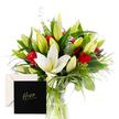From our Queensbury studio, this arrangement unfolds like a garden distilled into a single vase, a fresh, invigorating sensory moment. The brilliant white lilies rise with a pure, gently spicy fragrance, their trumpet shapes catching the light as they bloom among deep red roses. Between them, layers of glossy green fan and delicate weaving foliage cradle each stem, their edges catching glints of colour and bringing a sense of movement to the composition. The contrast between ivory lilies and ruby blooms is bold yet graceful, a quiet declaration of courage paired with tenderness. Wrapped in soft paper and tied with a discreet ribbon, the bouquet carries a message of appreciation and heroism-the florist's way of saying, you are extraordinary, you are valued. It makes a perfect gift for any occasion asking for heartfelt acknowledgment and admiration. In Queensbury, neighbours know a thoughtful bouquet can brighten a doorstep, and this design is often delivered across the area with same-day service to homes along the High Street, and nearby green spaces.

The scent mingles subtly: the lilies' clean sweetness with the roses' warm, classic bouquet aroma, finished by the cool glow of the green leaves. The leaves themselves-sharp and glossy-cradle the blossoms, while unopened buds promise beauty still to come. Crafted with care, this arrangement speaks of resilience, hope, and the grateful respect we extend to someone who stands out. The overall feeling is bold hospitality: a hero-worthy gesture that feels intimate, enduring, and deeply Queensbury.